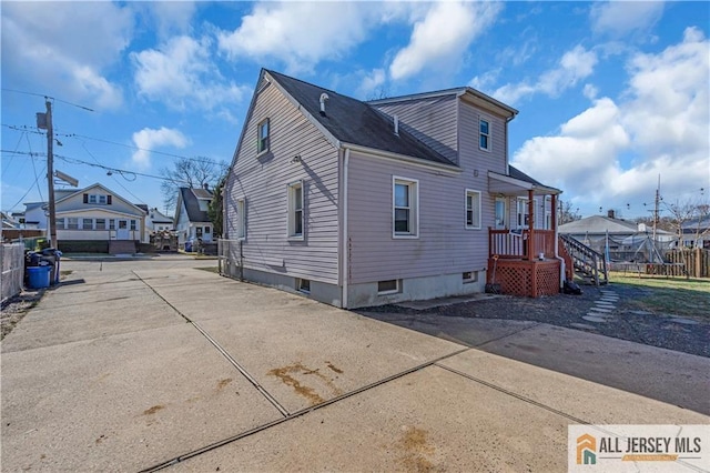 20 Cedar Ave, North Brunswick, NJ 08902 - view of property exterior featuring fence and a residential view