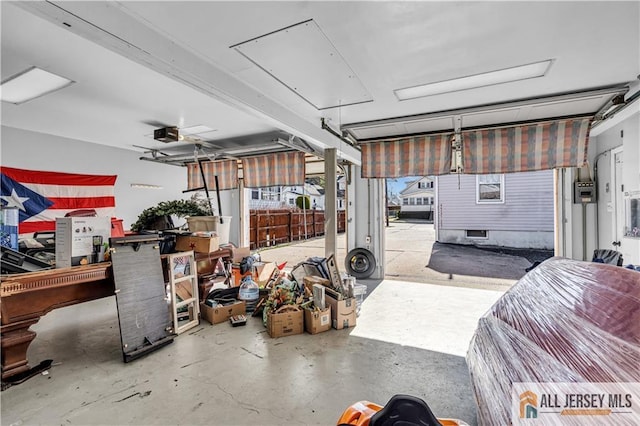 20 Cedar Ave, North Brunswick, NJ 08902 - garage featuring a garage door opener