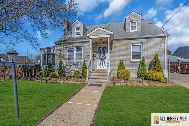 20 Cedar Ave, North Brunswick, NJ 08902 - new england style home featuring brick siding and a chimney