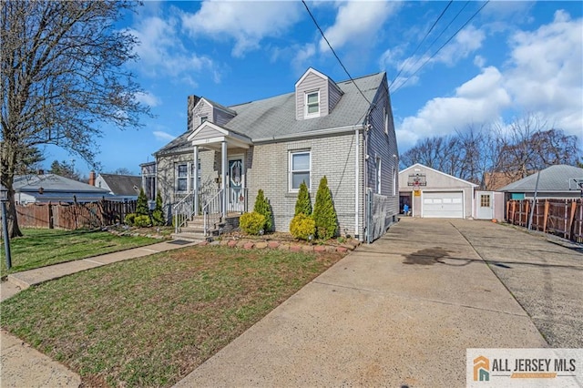 20 Cedar Ave, North Brunswick, NJ 08902 - cape cod home featuring an outdoor structure, brick siding, concrete driveway, and a garage