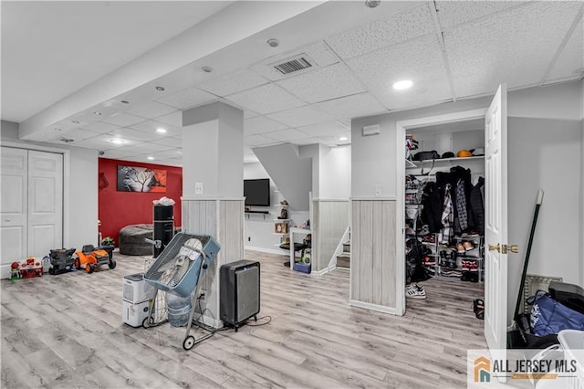 20 Cedar Ave, North Brunswick, NJ 08902 - exercise room featuring wood finished floors, a drop ceiling, wainscoting, and recessed lighting