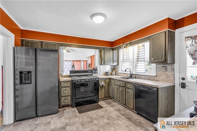 20 Cedar Ave, North Brunswick, NJ 08902 - kitchen with black appliances, a sink, light countertops, tasteful backsplash, and a ceiling fan