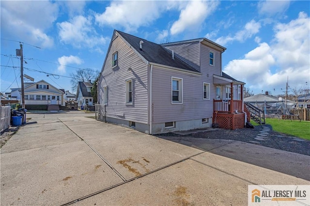 20 Cedar Ave, North Brunswick, NJ 08902 - view of property exterior with a residential view and fence
