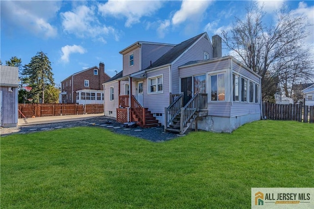 20 Cedar Ave, North Brunswick, NJ 08902 - rear view of property with a chimney