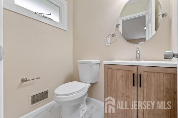 2164 Whitehorse Hamilton Square Rd, Hamilton, NJ 08690 - half bath with vanity and marble finish flooring