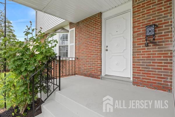 2164 Whitehorse Hamilton Square Rd, Hamilton, NJ 08690 - entrance to property with brick siding and a porch