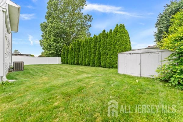 2164 Whitehorse Hamilton Square Rd, Hamilton, NJ 08690 - view of yard featuring a storage unit