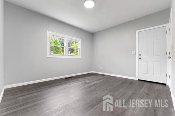 2164 Whitehorse Hamilton Square Rd, Hamilton, NJ 08690 - unfurnished room featuring dark wood-type flooring and baseboards