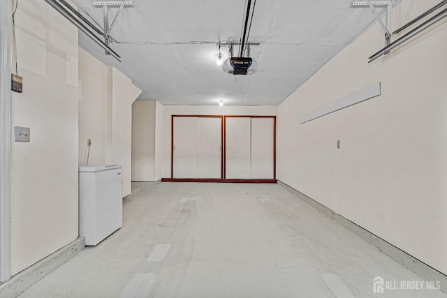 553-N Tilton Way, Monroe, NJ 08831 - garage with a garage door opener and fridge