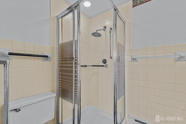 553-N Tilton Way, Monroe, NJ 08831 - full bath featuring tile walls, a shower stall, and toilet
