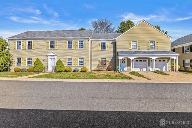 553-N Tilton Way, Monroe, NJ 08831 - view of front of home featuring concrete driveway and an attached garage