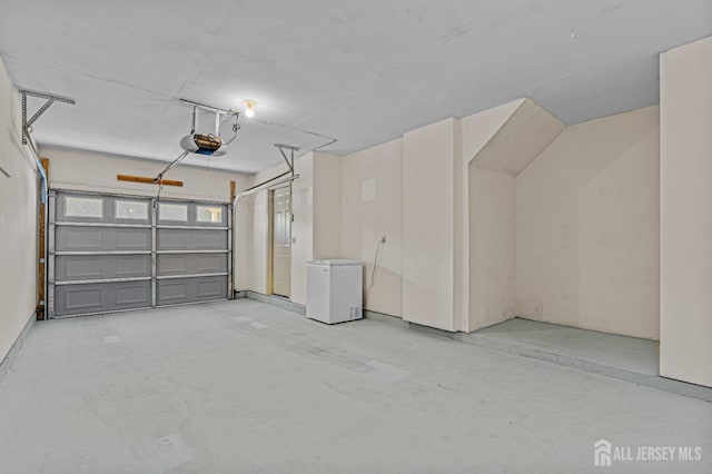 553-N Tilton Way, Monroe, NJ 08831 - garage with fridge and a garage door opener