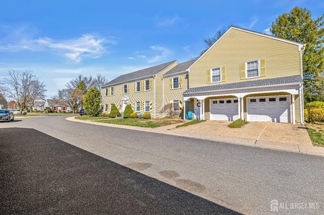 553-N Tilton Way, Monroe, NJ 08831 - view of front of home with a garage and driveway