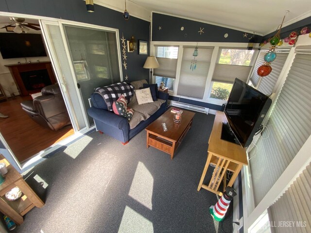 living room with vaulted ceiling and ceiling fan