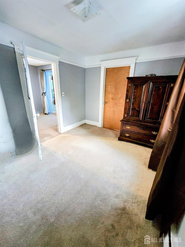 11 Melbourne St, Edison, NJ 08817 - unfurnished bedroom with light carpet and baseboards