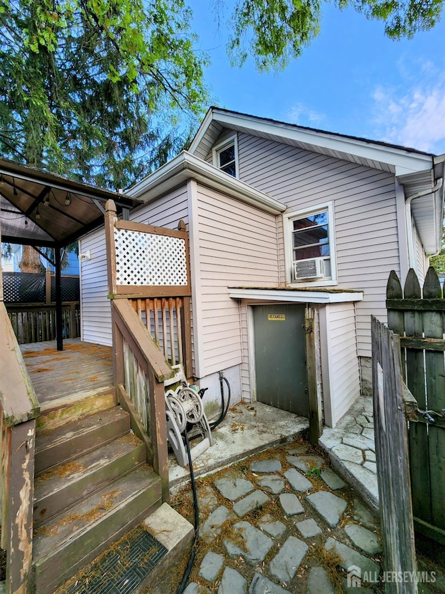 11 Melbourne St, Edison, NJ 08817 - back of property featuring a wooden deck and cooling unit