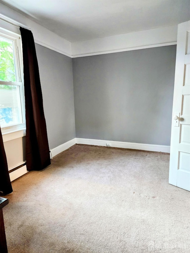 11 Melbourne St, Edison, NJ 08817 - carpeted empty room featuring baseboard heating and baseboards