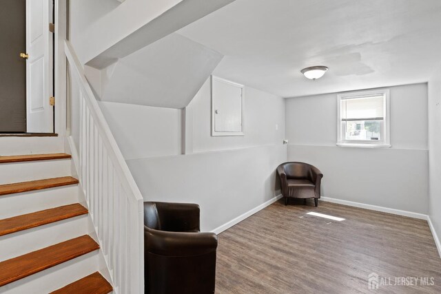 315 D St, Middlesex, NJ 08846 - unfurnished room with wood finished floors, baseboards, and stairway