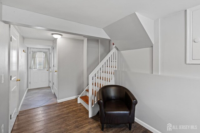 315 D St, Middlesex, NJ 08846 - living area with wood finished floors, stairs, and baseboards