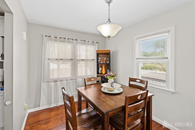 315 D St, Middlesex, NJ 08846 - dining room with baseboards and dark wood-style floors