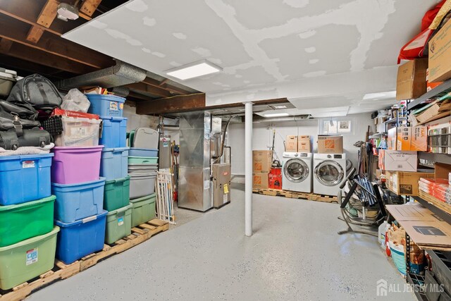 315 D St, Middlesex, NJ 08846 - basement with washing machine and dryer and heating unit