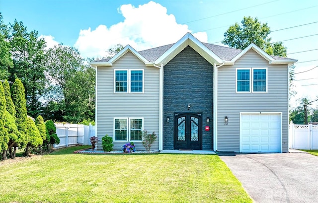 18 Rosewood Rd, Edison, NJ 08817 - view of front of home with french doors, stone siding, a garage, and driveway