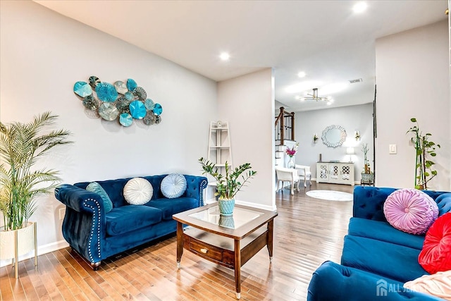 18 Rosewood Rd, Edison, NJ 08817 - living room with wood finished floors, recessed lighting, and a chandelier