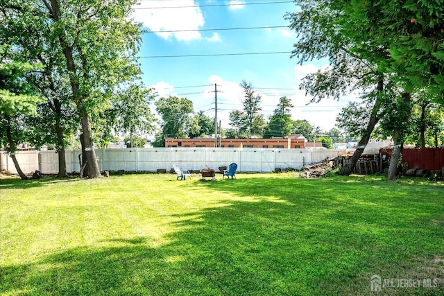 18 Rosewood Rd, Edison, NJ 08817 - view of yard with a fire pit