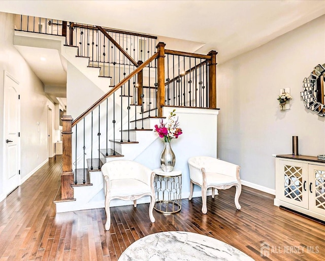 18 Rosewood Rd, Edison, NJ 08817 - stairs featuring hardwood / wood-style floors and baseboards