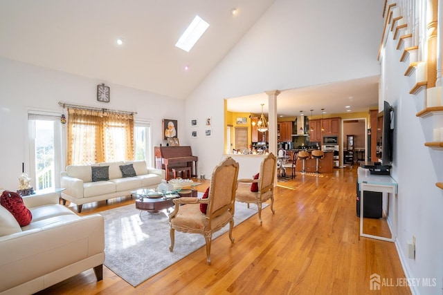 10 Eddie Ct, South Brunswick, NJ 08810 - living area featuring high vaulted ceiling, light wood-style floors, and recessed lighting