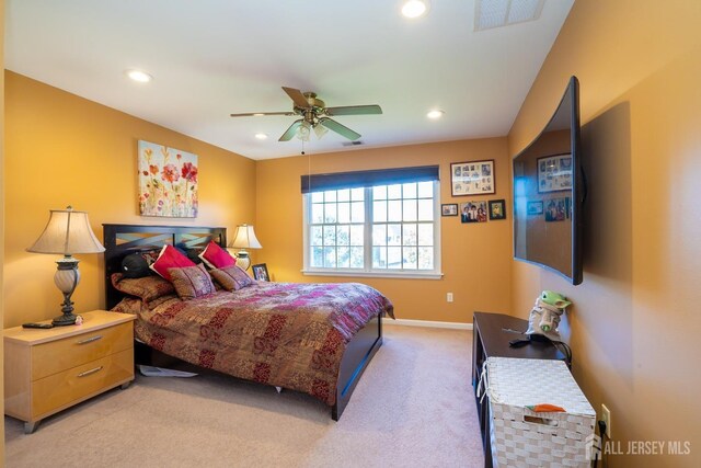 carpeted bedroom featuring ceiling fan