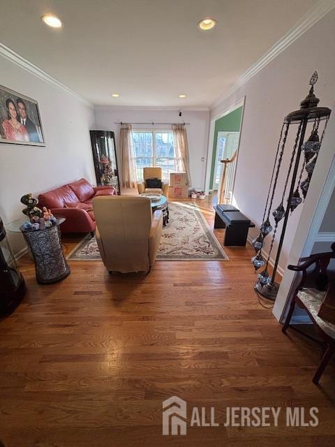 10 Eddie Ct, South Brunswick, NJ 08810 - living room with wood finished floors, ornamental molding, and recessed lighting