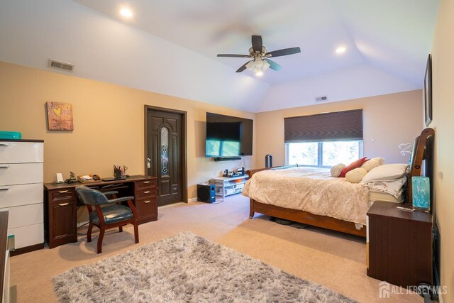 bedroom with lofted ceiling, light carpet, and ceiling fan