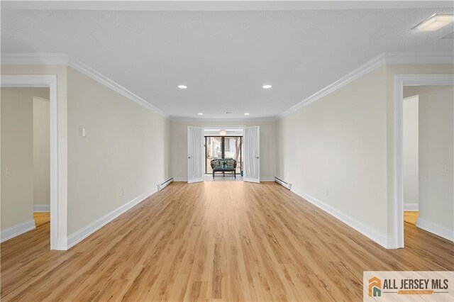 unfurnished living room with crown molding, baseboard heating, and light hardwood / wood-style flooring