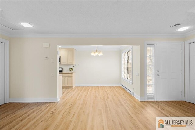 foyer entrance with a notable chandelier, crown molding, light hardwood / wood-style floors, and a baseboard heating unit