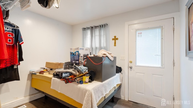 bedroom featuring wood finished floors