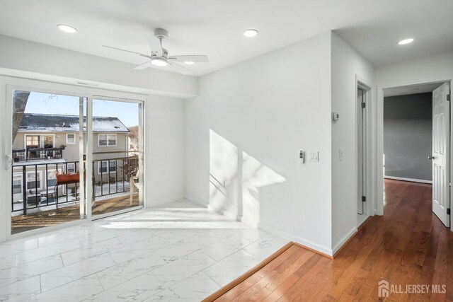 spare room featuring ceiling fan