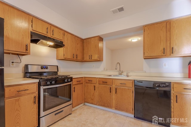 1027 Schmidt Ln, North Brunswick, NJ 08902 - kitchen with stainless steel range with gas stovetop, dishwasher, under cabinet range hood, light countertops, and brown cabinets