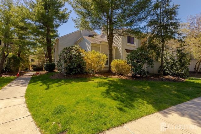 1027 Schmidt Ln, North Brunswick, NJ 08902 - view of front of house featuring a front lawn