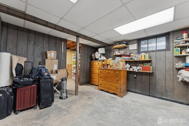 341 Ellis Pkwy, Piscataway, NJ 08854 - below grade area with wood walls and a drop ceiling