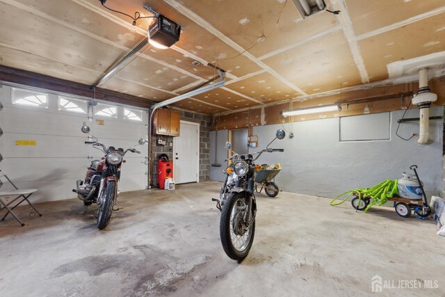 341 Ellis Pkwy, Piscataway, NJ 08854 - garage featuring a garage door opener