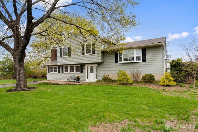 341 Ellis Pkwy, Piscataway, NJ 08854 - tri-level home featuring a front lawn