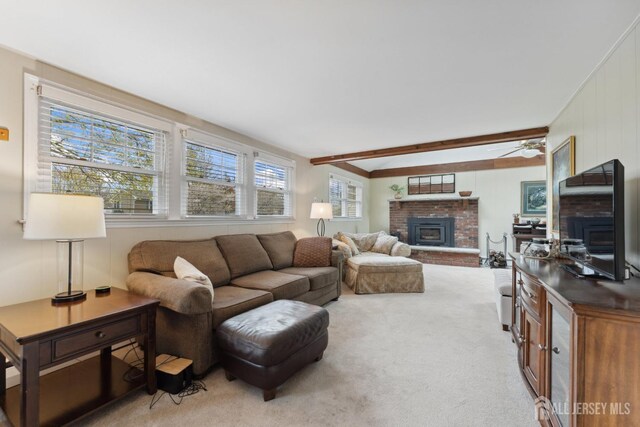 341 Ellis Pkwy, Piscataway, NJ 08854 - living room featuring a fireplace, light colored carpet, ceiling fan, and beamed ceiling