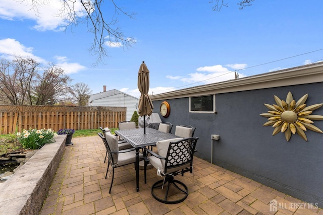 341 Ellis Pkwy, Piscataway, NJ 08854 - view of patio / terrace featuring fence and outdoor dining space