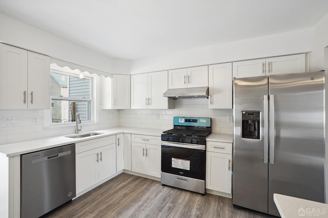 431-431 Garfield Ave, South Plainfield, NJ 07080 - kitchen featuring stainless steel appliances, under cabinet range hood, light countertops, and white cabinets