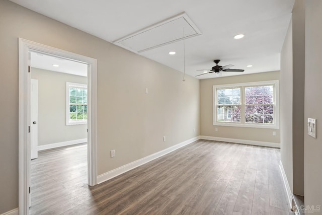 431-431 Garfield Ave, South Plainfield, NJ 07080 - spare room with attic access, wood finished floors, recessed lighting, and a ceiling fan