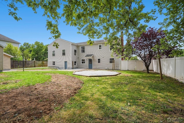 431-431 Garfield Ave, South Plainfield, NJ 07080 - rear view of property featuring a patio and a fenced backyard