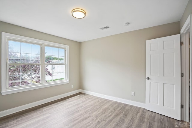 431-431 Garfield Ave, South Plainfield, NJ 07080 - empty room featuring wood finished floors and a smoke detector