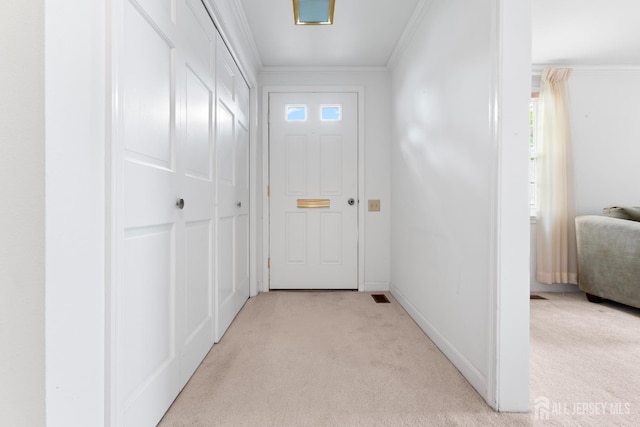 104 Glenwood Ln Unit A, Monroe, NJ 08831 - doorway featuring light carpet, ornamental molding, and baseboards