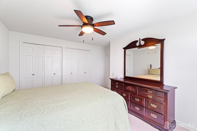 104 Glenwood Ln Unit A, Monroe, NJ 08831 - carpeted bedroom featuring multiple closets and a ceiling fan